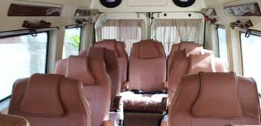 11 seater deluxe 1x1 tempo traveller hire in ahmedabad