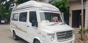 11 seater luxury tempo traveller hire in ahmedabad